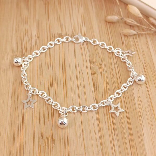 Pulsera edem bolitas+duje estrellita calada