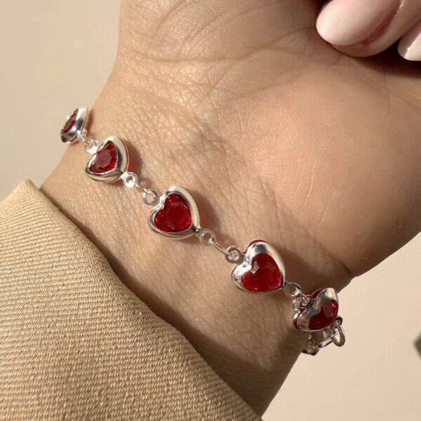 Pulsera corazones rojos