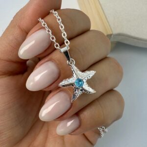 Collar dije estrella_ piedrita celeste