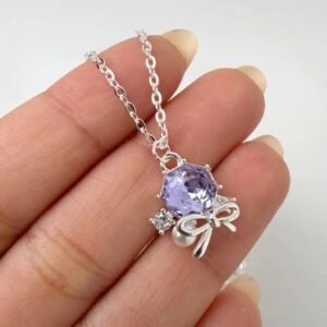 COLLAR PIEDRA VIOLETA + MOÑO